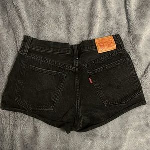 Levi black jean short. Size W27.